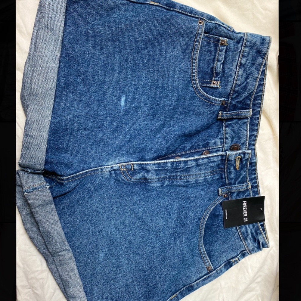 Slant pocket rolled hem denim shorts